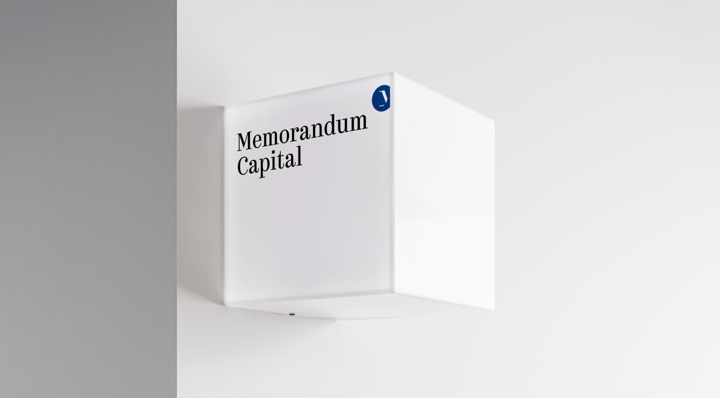 Memorandum Capital logo on a cube wall sign