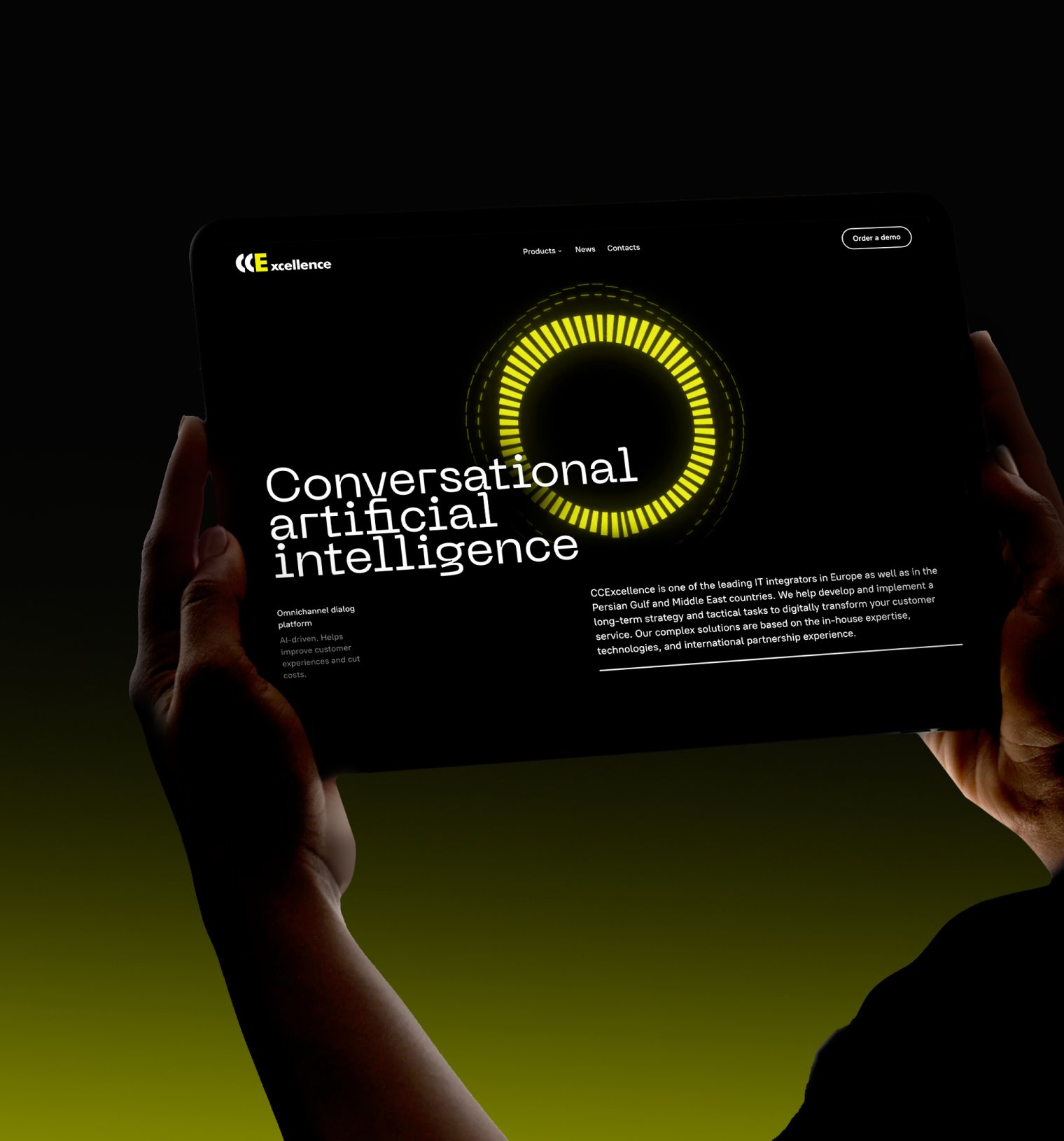 CC Excellence homepage on a tablet held in hands